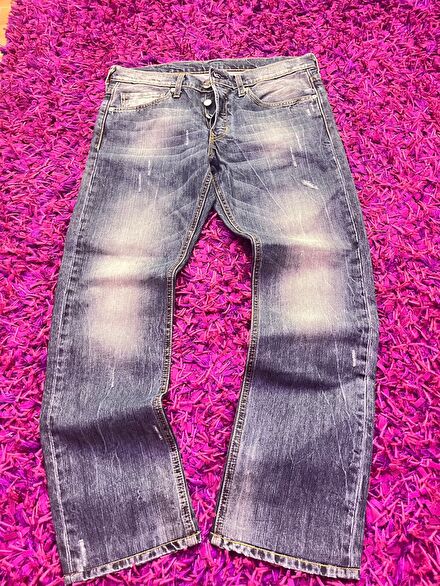 Vintage distressed rigid denim jeans